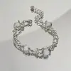Pulsera de Punto Asimétrica de Piedra Lunar de Alta Gama Estilo Dulce y Fresco para Mujer Verano 2025 Moda de Celebridad de Internet Elegante Versátil