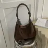 Bolsa tote casual versátil para o dia a dia, nova coleção de outono, material camurça, grande capacidade, estilo retrô europeu e americano, bolsa de ombro e bolsa transversal da moda