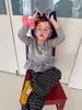 Conjunto de Niña 2026 Otoño Nuevo Estilo: Conjunto de Dos Piezas: Camiseta de Manga Larga con Bordado de Gatito 3D y Lazo y Pantalones de Pierna Ancha a Rayas
