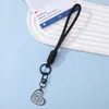 Nuevo llavero para teléfono con etiqueta en forma de corazón, cordón, llavero anti-pérdida, cuerda tejida, llavero con cuentas, accesorio, decoración de bolso