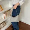 Bolso de cubo tejido de diseño minimalista de nicho para mujer 2026 nuevo bolso de axila de textura de alta calidad, bolso versátil de un solo hombro cruzado