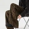 Calças de estampa de leopardo estilo europeu e americano para homens, estilo casual solto de alta rua, calças retas de perna larga estilosas e com bom caimento para primavera e outono