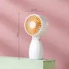 Mini ventilador de mão ventilador de mesa pequeno cor de doce vertical três ventos recarregável por USB ventilador elétrico portátil atacado