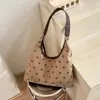 Bolso de mujer transfronterizo, modelo nuevo 2026, diseño de nicho, gamuza de lunares, bolso de hombro color-blocking, bolso de axila retro a la moda