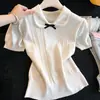 Top de punto trenzado color albaricoque con cuello de muñeca y manga corta para mujer, nuevo de verano 2026, ajuste ceñido, cintura estrecha, cuello vuelto, top corto