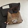 Mochila Nova Moda 2025 Bolsa de Ombro Único Transversal de Grande Capacidade Bolsa Casual Feminina Desenho Animado Letra Bolsa de Bolinho
