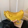 Bolso de mujer súper popular transfronterizo 2026 nuevo nicho bolso tipo bollo para debajo del brazo con un diseño de alta gama, elegante y versátil, adecuado para llevar al hombro o cruzado