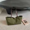 Bolsa de lona de gran capacidad para mujer, nueva bolsa de mano casual de otoño 2026 para la escuela y el trabajo, de hombro y de mano