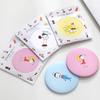 Mini espejo portátil plegable de doble cara con dibujos animados, pequeño espejo de maquillaje de mano para estudiantes.