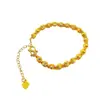 Suministro en vivo nuevo pulsera de cuentas doradas ojo de gato para mujer pendientes de temperamento collar Joker joyería de cobre chapada en oro al por mayor