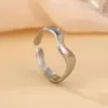 Anillo de Titanio para Mujer con Diseño de Ola de Moda Popular, Apertura Ajustable, Anillo Suelto de Acero de Titanio