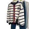 Suéter cardigan de rayas color block nuevo 2026, top de punto versátil de estilo coreano para otoño/invierno, ajuste holgado, cuello redondo
