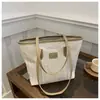 Bolso tote tejido para mujer, bolso de hombro de gran capacidad, nuevo bolso versátil casual para el día a día 2025