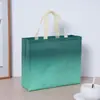 Bolsas de compras personalizadas em TNT, bolsas de compras tridimensionais em branco prensadas a quente, bolsas de publicidade corporativa feitas sob medida