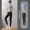 Conjunto de Ropa de Yoga sin Costuras Europea y Americana para Mujer, Camiseta Deportiva de Manga Corta para Fitness, Pantalones de Tiro Alto tipo Durazno para Levantar Glúteos, Conjunto Deportivo para Gimnasio y Running