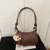 Bolso de mano para la oficina con patrón de lichi para comercio exterior transfronterizo, nuevo diseño de moda 2026, bolso tejido con textura de gran capacidad para hombro y cruzado