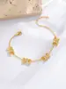 Pulseira Nove Flores Tridimensional com Logo do Arco do Triunfo, Pulseira Cinco Flores, Corrente para Clavícula com Vários Pingentes, Corrente para Suéter de Luxo Leve, Novo Estilo de Acessório para Mão