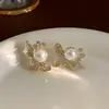 Aretes S925 Aguja de Plata Diamantes Coreanos Incrustados Girasol Calado Pequeños Estilo Chanel Nicho Diseño de Alta Gama Aretes Joyería