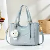 Bolso Pequeño de Alta Gama y Estilo para Mujer 2025 Nuevo Invierno Versátil Bolso Cruzado de Moda Súper Popular Bolso de Mano Bolso Cubo