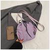 Bolso bandolera de hombro único de estilo coreano para comercio exterior, bolso de cubo fresco con cordón para mujer, bolso de hombro pequeño casual de nailon texturizado transfronterizo