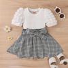 Traje de primavera y verano para niñas de Amazon, estilo europeo y americano, con mangas abullonadas y falda a cuadros con lazo, venta al por mayor