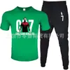 Moda de Comércio Exterior Camiseta Masculina de Manga Curta Calça Terno Casual Gola Redonda Cor Lisa Estampa de Letras Roupa Esportiva Casual