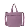 Bolsa Casual Popular Transfronteiriça de Grande Capacidade para Mulheres 2026 Nova Bolsa Leve para o Dia a Dia Bolsa Tote Versátil de Cor Sólida
