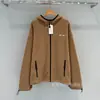 Jaqueta com zíper e capuz em fleece de alta qualidade da série MIU "Shenzhen Nanyou", disponível em estoque, jovem e versátil para homens e mulheres.