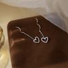 Aretes huecos en forma de corazón de amor para mujer, aretes simples de nicho con borla larga, aretes de diseño elegante de alta gama de lujo ligero, moda