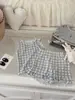 87018 Conjunto de Roupa de Casa para Meninas 2026 Nova Coleção Início da Primavera Conjunto de Duas Peças com Body e Shorts de Tricô Respirável e Absorvente