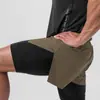 Pantalones Cortos para Hombre 2026 Estilo Americano con Forro, Falso Dos Piezas, de Tres Cuartos de Longitud, Arriba de la Rodilla, Pantalones Cortos de Baloncesto, Pantalones Deportivos de Entrenamiento