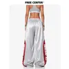 Pantalones de chándal brillantes de estilo americano con bloques de color y estampado de letras de alta costura, pantalones casuales holgados y fluidos de pierna ancha para mujer