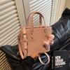 Bolso de mano de textura de alta gama de nueva moda 2025 para mujer, bolso de hombro tipo cubo con bandolera, bolso popular de comercio exterior de este año
