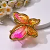 Moda europeia e americana transfronteiriça, luxo leve, design de nicho minimalista, presilha de cabelo com flor de metal dourada e borda de flor para penteados altos