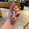 Nuevo Llavero de Pata de Gato y Cachorro de Dibujos Animados, Colgante para Mochila de Estudiante, Decoración de Bolso con Muñeca Pequeña, Regalo Pequeño