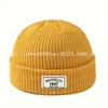 Estilo Europeo y Americano Versátil Gorro de Punto con Etiqueta Inglesa Casual Simple Color Sólido Grueso Cálido Gorro de Punto