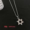 Collar de cruz apilada de doble capa de hip-hop transfronterizo europeo y americano para hombre, diseño de nicho moderno, cadena cubana con sentido de acero de titanio a juego.