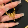 Collar de hierba rizada de seda de color dorado para mujer, cadena de clavícula de lujo ligera de alta gama, diseño de nicho, joyería al por mayor