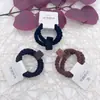 Nueva Cuerda Trenzada Simple de Pelo con Etiqueta de Cuero Anillo para el Cabello Color Té con Leche Alta Elasticidad Banda Elástica para el Cabello de Niña Adorno para la Cabeza