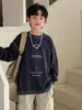 Sudadera para Niños Otoño 2026 Nuevo Estilo Camiseta de Manga Larga para Niños Estilo Urbano Fresco Blanca Para Niños Grandes Capa Base de Primavera y Otoño