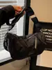 Bolso acolchado de nailon para mujer Otoño e Invierno 2025 Nuevo de moda Estilo coreano Bolso de mano casual Versátil Gran capacidad Bolso cruzado