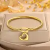 Pulsera Abierta de Corazón Hueco Torcido para Pareja, Moda Transfronteriza, Estilo Simple Europeo y Americano, Elegante Pulsera de Joyería de Acero Inoxidable con Forma de Corazón de Amor
