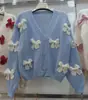 Top corto de chica dulce de venta caliente 2025, holgado, con lazo tridimensional y cuello suelto, manga larga, disponible en plataformas transfronterizas