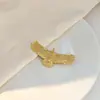 Europa e Estados Unidos Broche de anjinho girassol criativo transfronteiriço simples liso doce plissado águia pino de aço inoxidável