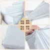Saco expresso branco de material novo de baixa voltagem, especial para travessia de fronteira, à prova d'água, à prova de umidade, saco para roupas, especial para e-commerce