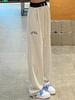 Calça esportiva feminina de outono e primavera, estilo high street americano, com costura de cor contrastante, drapeada, solta, casual, modeladora, perna reta, com elástico no tornozelo, perna larga