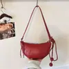 Bolso de cuerno de diseño minimalista de nicho transfronterizo, bolso casual y elegante tipo dumpling, bolso de hombro y cruzado versátil y moderno para el día a día