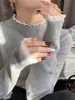 Top de punto blanco con encaje patchwork estilo francés de cuello alto para mujer, capa base de otoño e invierno, suéter ajustado para interior