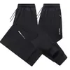 Calça esportiva masculina de peso pesado, calça casual nova para primavera e outono, calça jogger moderna, solta e versátil, calça comprida masculina