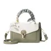 Bolsa Cuadrada Pequeña con Bordado de Flor Minimalista para Mujer 2026 Nueva Versátil Hebilla Bolso Cruzado Textura de Lujo Ligero Bolso de Mujer Transfronterizo